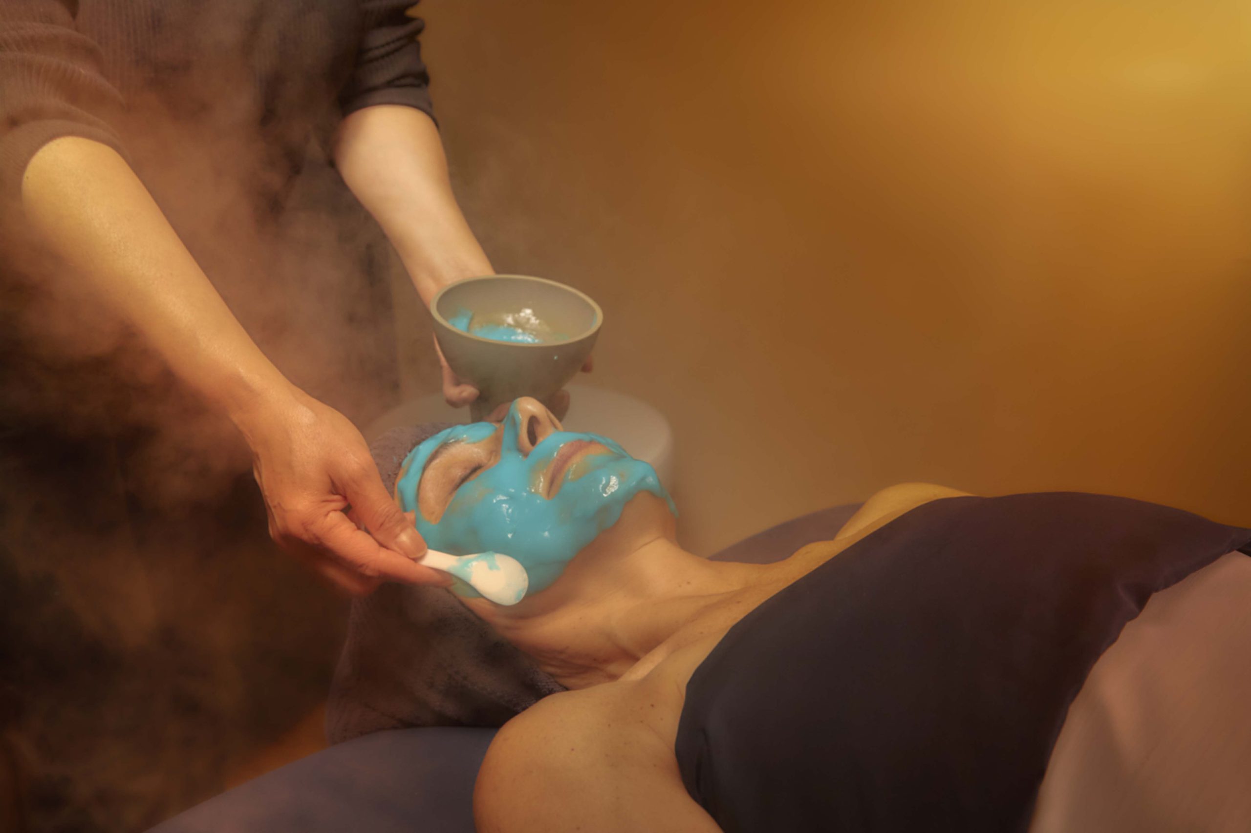 Person receiving a facial treatment at Willowbrook Spa in Finger Lakes